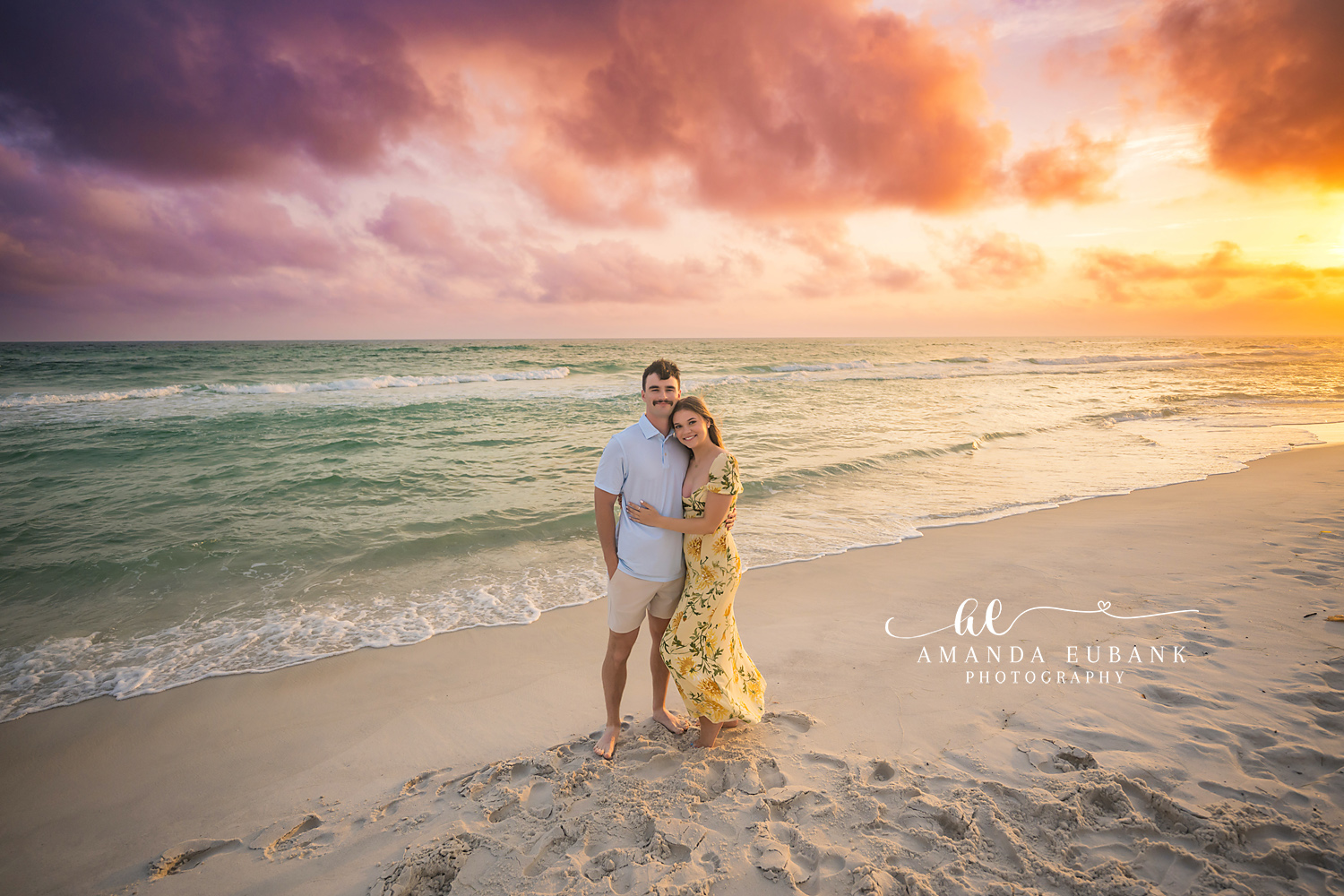 Yellow Dress at Golden Hour | Tampa Engagement Photographer A couple side by side on the beach with her yellow floral dress catching the light during a Tampa engagement photography session.