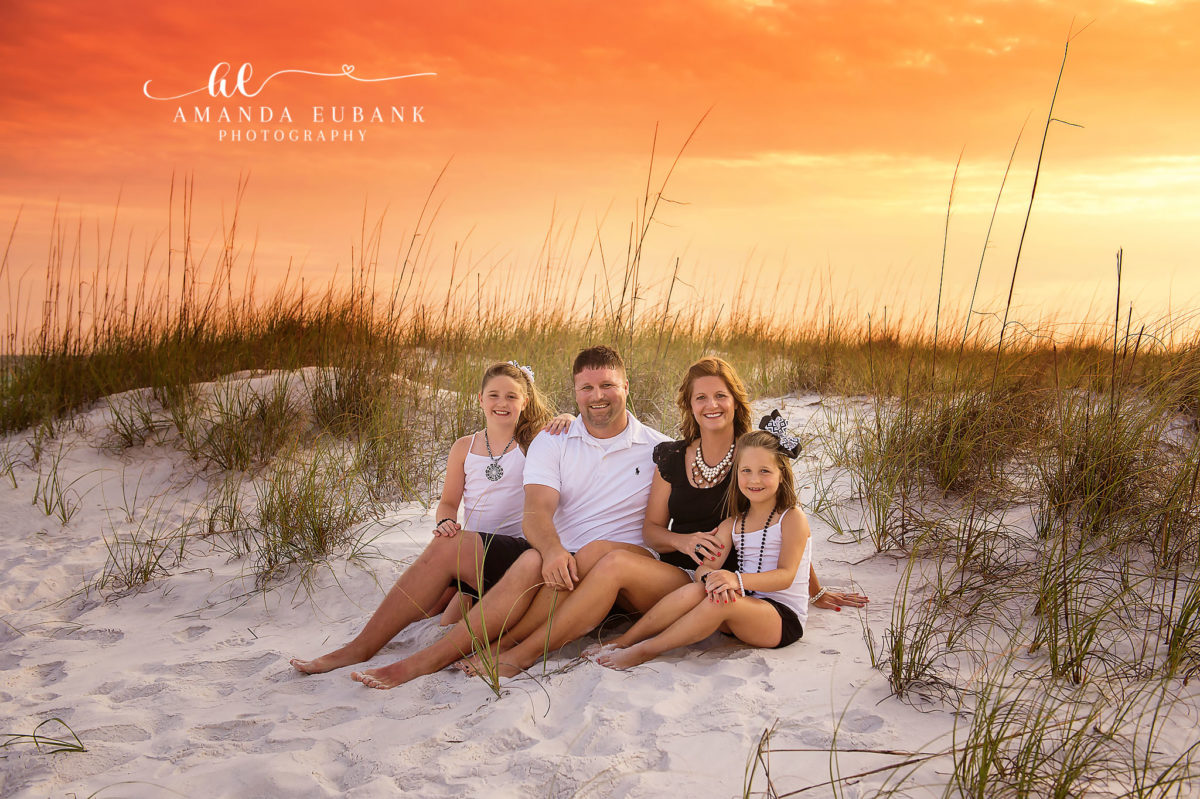 Family Session in the Dunes | Tampa Beach Family Photography Tampa family photographer captures a family of five gathered in the dunes in warm late sunset light.