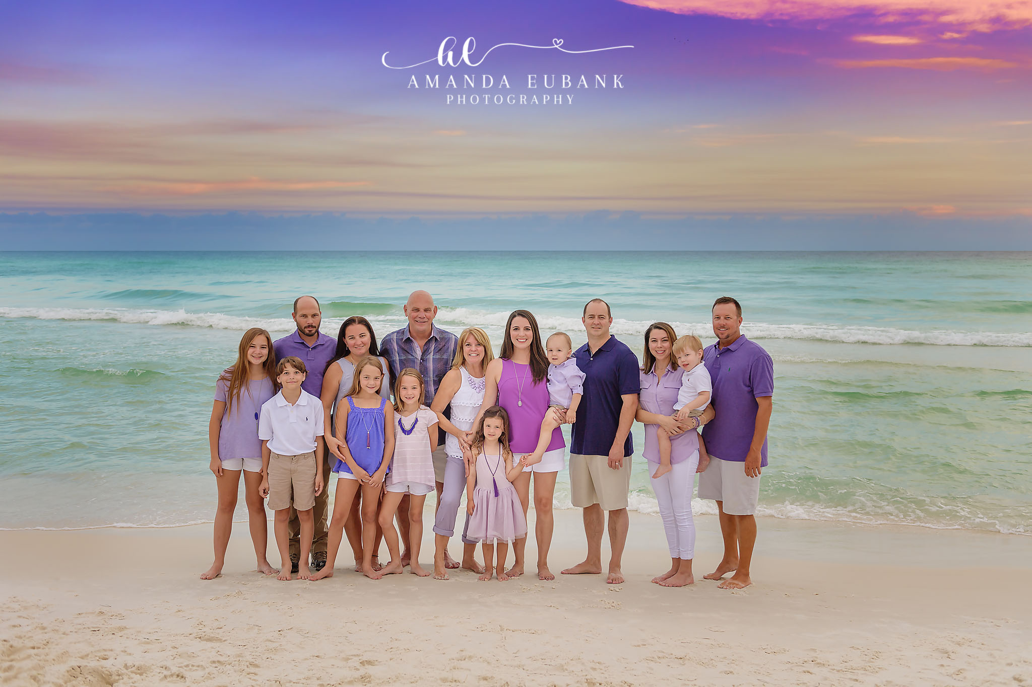 Extended Family Portrait | Large Family Beach Photos in Tampa, FL Tampa extended family photographer captures an extended family of fifteen gathered on the beach in purple and white.