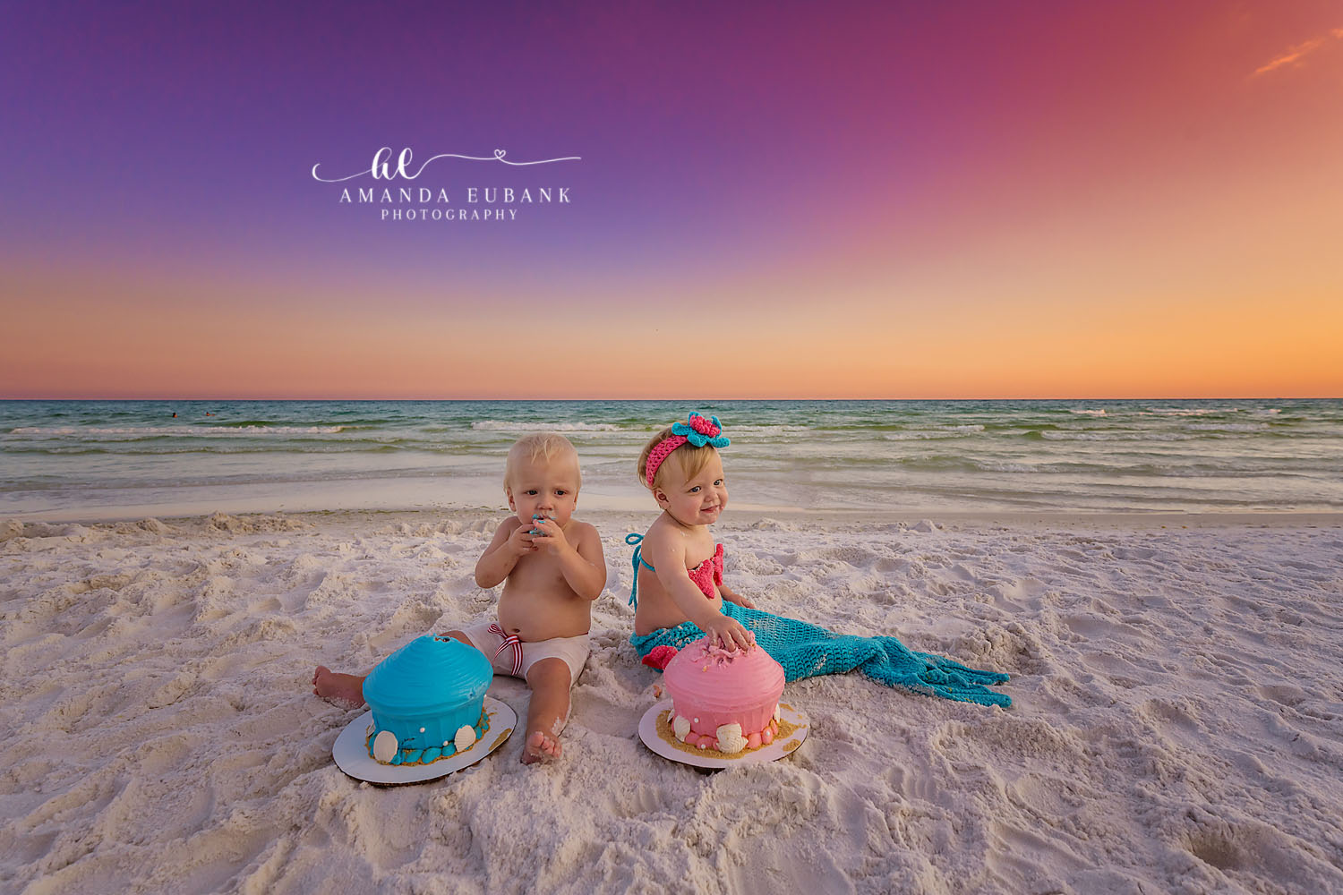 Twin Cake Smash on the Beach | Tampa Baby & Milestone Photographer Twin babies at their first birthday cake smash on the sand during a baby milestone session in Tampa, Florida.