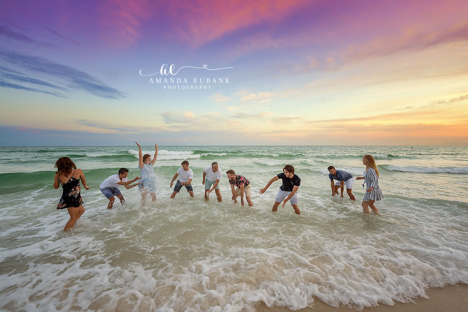 Kids Splashing in the Surf | Kids Beach Portraits in Tampa, FL Tampa children’s photographer captures a group of children splashing and jumping through the surf at sunset.