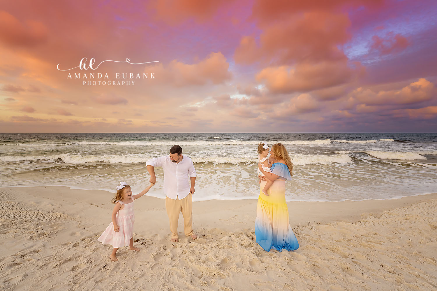 Ombre Gown on the Beach — Tampa, FL Family Session Parents and their two girls on the beach with mom in a yellow and blue ombre gown at a beach family session near Tampa, Florida.