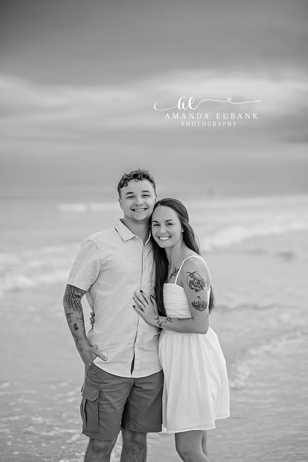Black and White Couple Portrait | Tampa Beach Couples Photography Tampa couples photographer captures a black and white portrait of a couple standing together on the beach.