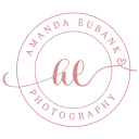 Circular Amanda Eubank Photography logo in blush pink, the brand mark of a Tampa, Florida portrait photographer.