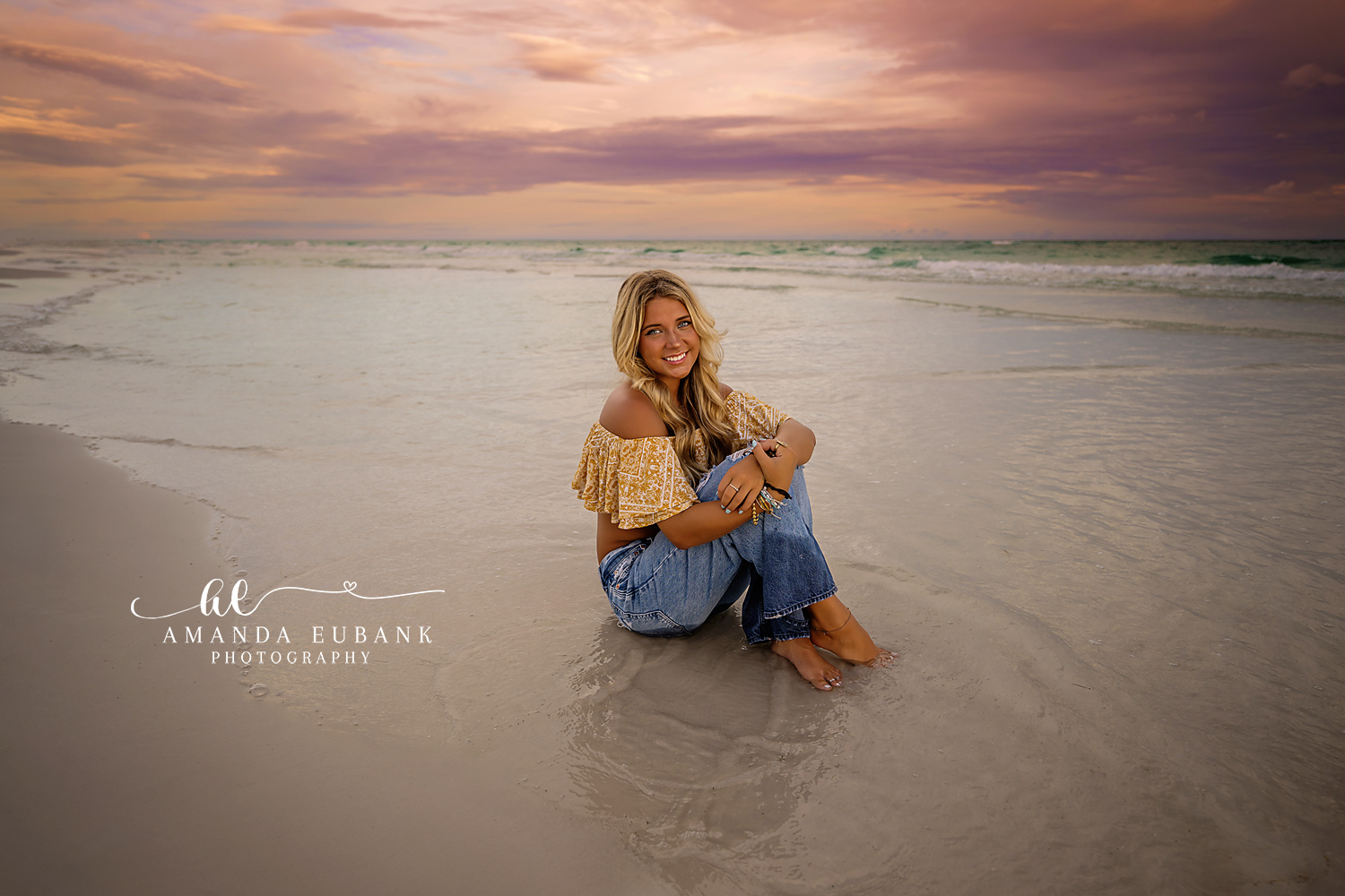 Wet Sand Reflection Portrait | Senior Portraits in Tampa, FL Tampa senior photographer captures a senior seated on the shoreline with her reflection in the wet sand.