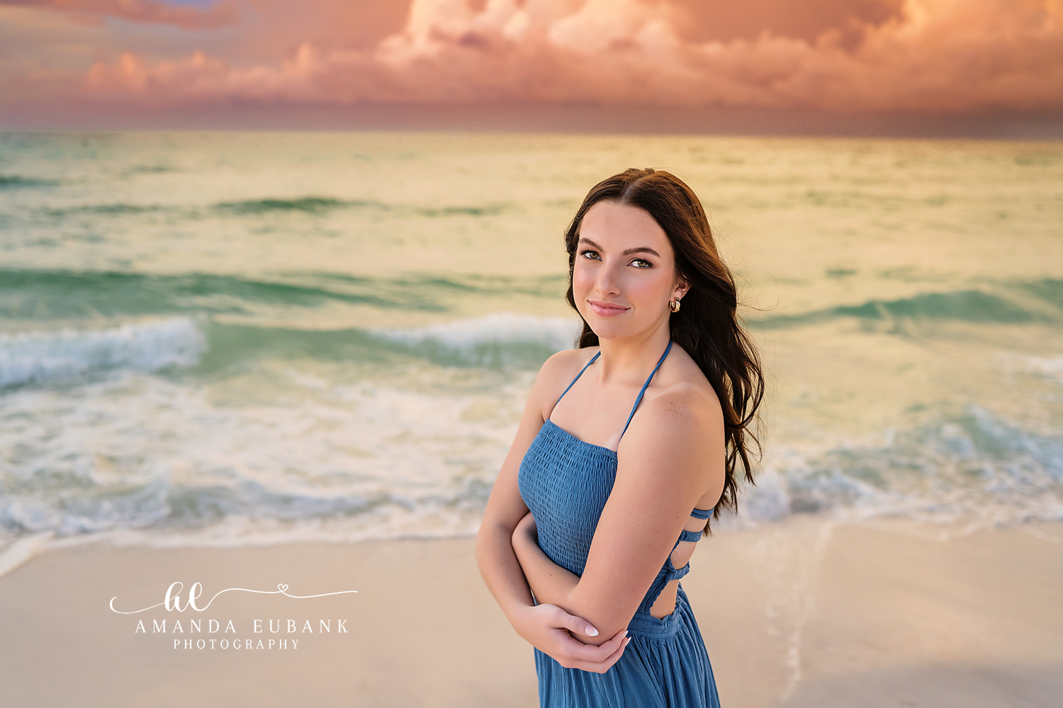 Blue Gown Portrait by the Waves — Tampa Bay Senior Photography A close portrait of a senior in a blue gown with green surf behind her at a beach senior session in Tampa, FL.