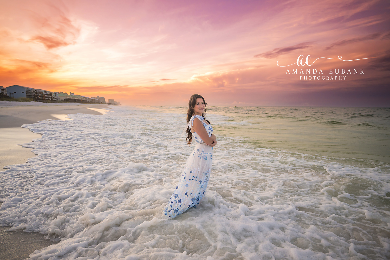 Standing in the Churning Surf — Tampa Bay Senior Photography A senior in a floral maxi dress standing in churning surf at sunset at a beach senior session in Tampa, FL.