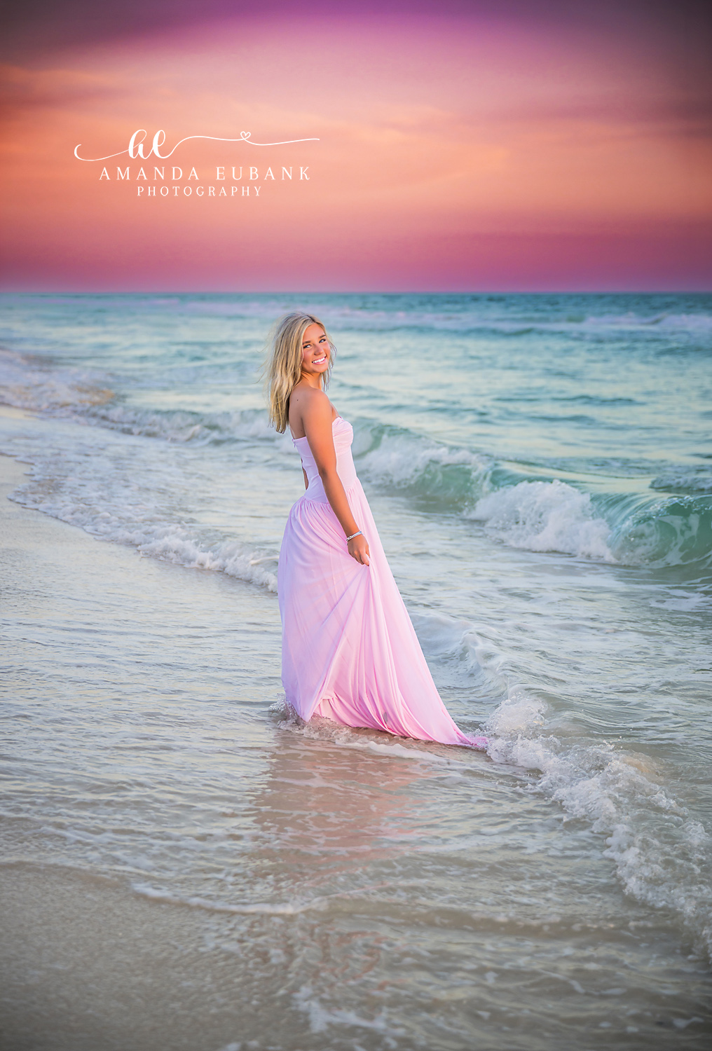 Pink Gown on the Wet Sand — Tampa Bay Senior Photography A senior in a pink gown on the wet sand as the sky turns lavender at a beach senior session in Tampa, FL.