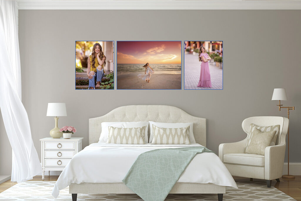 Three framed senior portraits displayed above a bed in a gray bedroom